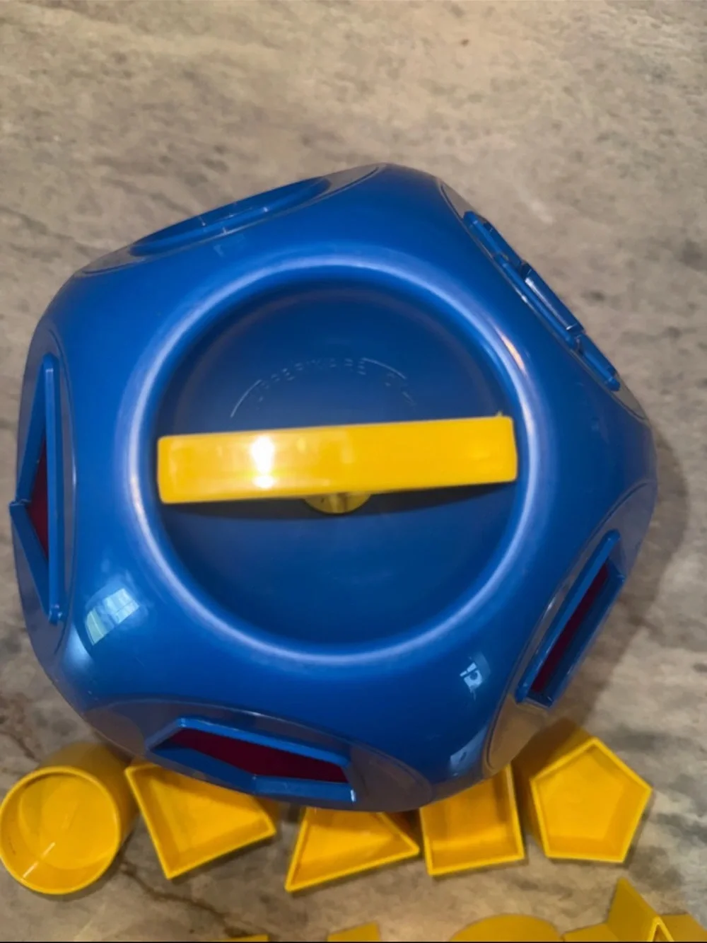 Tupperware Red Shape Sorter Ball with Yellow Geometric Pieces